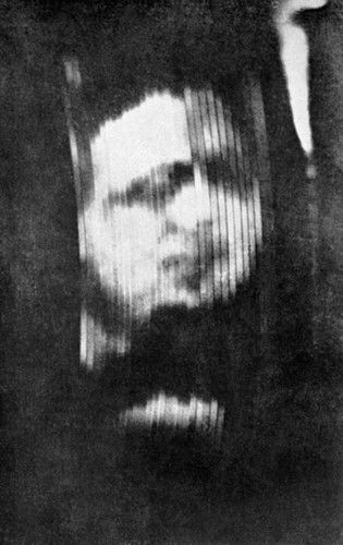 Figure 7 — One of the earliest recorded photographs of a television image received on a mechanical television system. The portrait orientation and extreme close-up framing necessary to extract a recognisable …